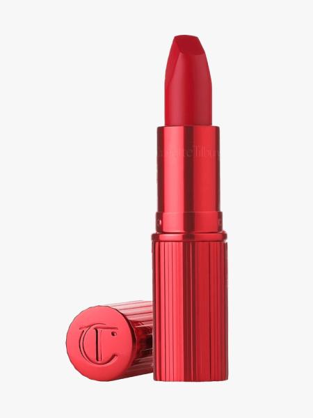 Charlotte Tilbury Matte Revolution Hydrating Lipstick in Hollywood in branded component on a light gray background
